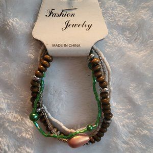 NWT 4 Strand Elastic Bracelet
